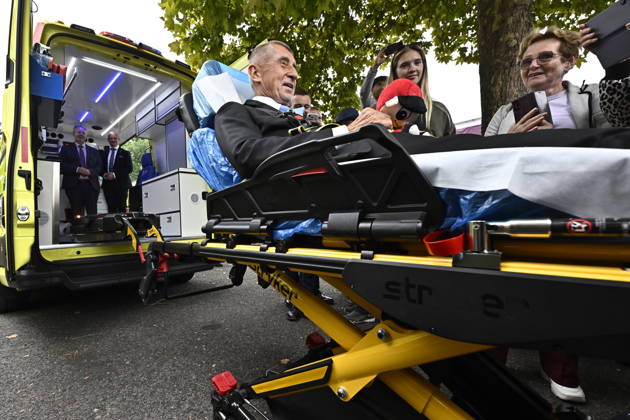 Czech Prime Minister Andrej Babis (ANO) tries out the stretcher in a new ambulance during the handover of ambulances to the Usti nad Labem Region Emergency Medical Service on September 11, in Litomerice, Czech Republic. (CTKxPhoto OndrejxHajek) CTKPhotoP2026091105883  CTKPhotoP2026091105883