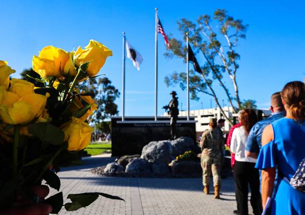 September 11, 2026, Tampa, Florida, USA: Flowers are distributed to guests in line during the flower tribute at the end of the 9 11 25th Anniversary Memorial Service hosted by U.S. Special Operations Command (USSOCOM) to honor the 25th anniversary of the Sept. 11 terrorist attacks at the MacDill AFB Special Operations Forces Memorial on Friday, Sept. 11, 2026 in Tampa. Tampa USA - ZUMAs70_ 20260911_zan_s70_008 Copyright: xDirkxShaddx