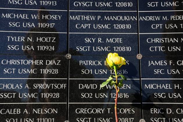 September 11, 2026, Tampa, Florida, USA: A flower rests against the dedicated wall honoring roughly 1,900 fallen special operations service members during the 9 11 25th Anniversary Memorial Service hosted by U.S. Special Operations Command (USSOCOM) to honor the 25th anniversary of the Sept. 11 terrorist attacks at the MacDill AFB Special Operations Forces Memorial on Friday, Sept. 11, 2026 in Tampa. Tampa USA - ZUMAs70_ 20260911_zan_s70_003 Copyright: xDirkxShaddx