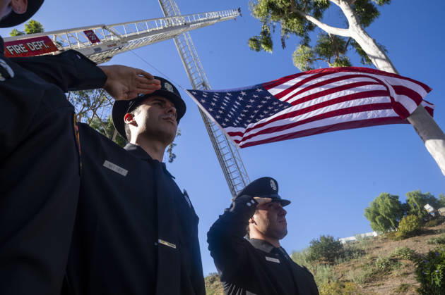 September 11, 2026, Los Angeles, California, USA: Members of the Los Angeles Fire Department salute as the department marks the 25th anniversary of the Sept. 11 terrorist attacks at the Frank Hotchkin Memorial Training Center in Los Angeles, California, on Sept. 11, 2026. Los Angeles USA - ZUMAc68_ 20260911_zaf_c68_003 Copyright: xRingoxChiux