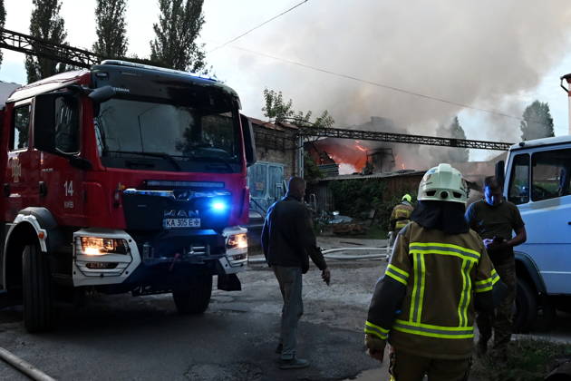 Russian Air Attack On Kyiv, Ukraine Firefighters work near the scene of a fire after a jet-powered drone struck an office building in Kyiv s Podilskyi district, on September 11, 2026. Kyiv Ukraine  Copyright: xOleksandrxGusevx originalFilename: gusev-notitle260911_npRmF.jpg