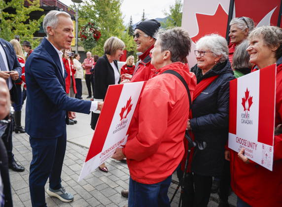 September 11, 2026, Banff, Ab, CANADA: Prime Minister Mark Carney, left, meets with Forever Canadian volunteers following a cabinet retreat in Banff, Alta., Friday, Sept. 11, 2026. Banff CANADA  - ZUMAc35_ 20260911_zaf_c35_086 Copyright: xJeffxMcintoshx