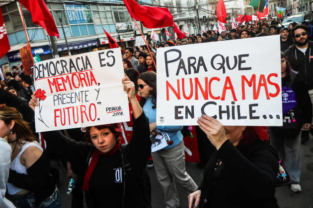 September 11, 2026, Valparaiso, Chile: Protesters hold placards expressing their opinion during a demonstration march commemorating the 53rd anniversary of the coup d Ãˆtat in ValparaÃaso. Valparaiso Chile - ZUMAs197 20260911_aaa_s197_417 Copyright: xCristobalxBasaurexArayax