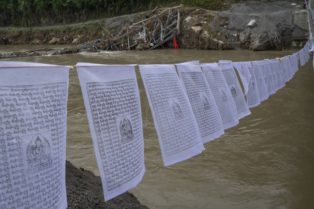 Aftermath of the devastating flash floods in Nepal NUWAKOT, NEPAL - SEPTEMBER 15: A view of the destruction following the devastating flash floods on August 26 that struck Devighat, Nuwakot, Nepal, on September 15, 2026. People in the affected areas of Nuwakot continue to return in search of their destroyed homes and the last remaining memories of their lives. Some are trying to recover essential belongings from the rubble, while others are working with family members to remove soil from parts of their homes buried underground and make them habitable again. The destruction in Devighat village is severe. Many multi-storey buildings have collapsed, while some have been buried under earth up to the level of their fifth floors. Religious figure  Copyright: x2026xAnadoluxAbdulxGonix