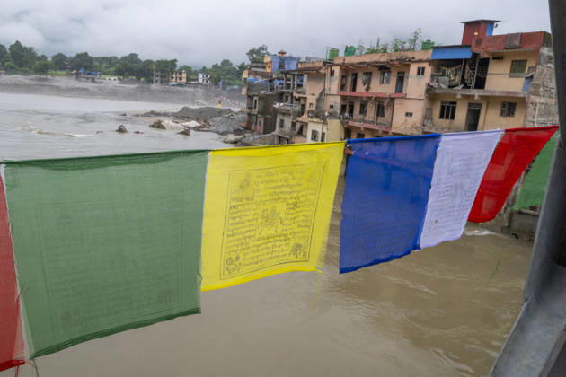 Aftermath of the devastating flash floods in Nepal NUWAKOT, NEPAL - SEPTEMBER 15: A view of the submerged landscape following the devastating flash floods on August 26 that struck Devighat, Nuwakot, Nepal, on September 15, 2026. People in the affected areas of Nuwakot continue to return in search of their destroyed homes and the last remaining memories of their lives. Some are trying to recover essential belongings from the rubble, while others are working with family members to remove soil from parts of their homes buried underground and make them habitable again. The destruction in Devighat village is severe. Many multi-storey buildings have collapsed, while some have been buried under earth up to the level of their fifth floors. Religiou  Copyright: x2026xAnadoluxAbdulxGonix
