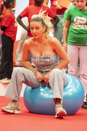 ABB CHILDREN S DAY Anna Carina Woitschack sits on a bouncy ball at Children s Day at the Atelier Gardens in Berlin on September 17, 2026