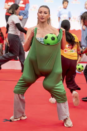 ABB Children s Day: Anna Carina Woitschack Catching a Ball in Baggy Pants at the Children s Day event at the Atelier Gardens Berlin on September 17, 2026