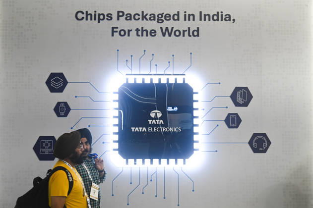 September 19, 2026, New Delhi, Delhi, India: People pass by Tata Electronics kiosk at the Semicon India Expo 2026 in New Delhi, India on September 19, 2026. New Delhi India  - ZUMAj168 20260919_zip_j168_004 Copyright: xKabirxJhangianix