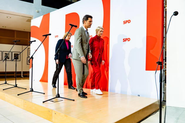 SPD Party Chair Bärbel Bas (L) and the SPD’s top candidates in Mecklenburg-Western Pomerania, Manuela Schwesig (R), and in Berlin, Steffen Krach (C), leave a press conference at the Willy Brandt House in Berlin on September 21, 2026. Reactions to the state elections in Mecklenburg-Westernlenburg-Vorpommern and Berlin