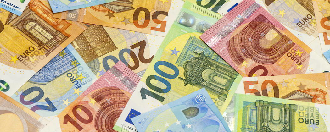 Euro Banknotes: A large number of euro bills and banknotes are piled together, serving as a symbolic image of a strong euro currency. FOR EDITORIAL USE ONLY