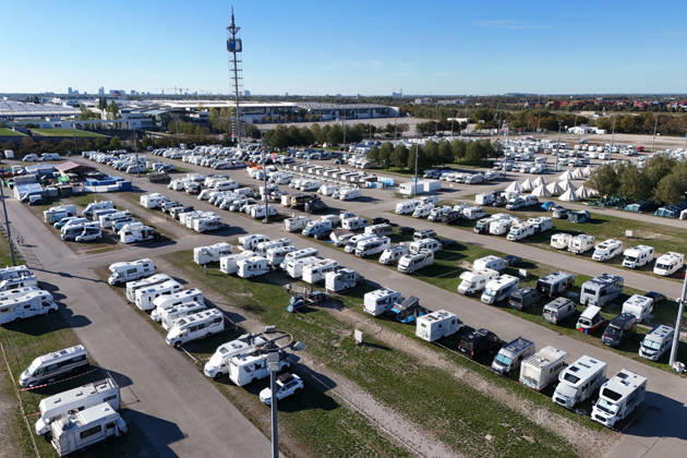 Oktoberfest Camping at the Munich Riem Exhibition Center; RVs are parked in the exhibition center parking lot