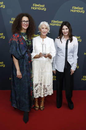 Malika Rabahallah, Helen Mirren, and Iris Berben at the premiere of the film *A Talent for Murder* and the Douglas Sirk Award ceremony at the 34th Filmfest Hamburg at Cinemaxx Dammtor in Hamburg, Germany, September 29, 2026 Foto:xC.xTamckex xFuturexImagex mirren_6943
