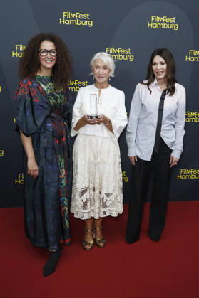 Malika Rabahallah, Helen Mirren, and Iris Berben at the premiere of the film *A Talent for Murder* and the Douglas Sirk Award ceremony at the 34th Filmfest Hamburg at Cinemaxx Dammtor in Hamburg, Germany, September 29, 2026 Foto:xC.xTamckex xFuturexImagex mirren_6944