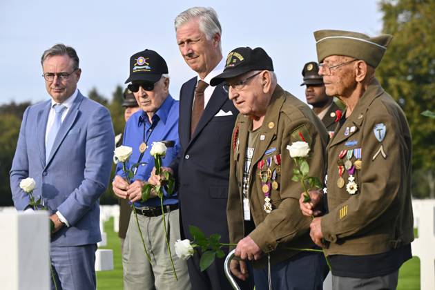 Prime Minister Bart De Wever and King Philippe - Filip of Belgium are pictured with war veterans during a royal visit to the World War II Commemoration at the American Military Cemetery in Henri-Chapelle, Plombieres, on Friday 2 October 2026. The ceremony pays tribute to the American veterans in attendance and to their fallen comrades-in-arms. It features testimonials, musical performances, and prayers, as well as a wreath-laying ceremony, a salute, and a flyover by U.S. aircraft. ERICxLALMAND 188545471