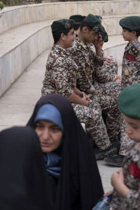 Opening Ceremony Of Second City-Square Military Training Camp Two veiled women converse while Iranian schoolboys wearing Iranian Army military uniforms speak with each other during the opening ceremony of the second city-square military training camp for self-sacrificing forces in downtown Tehran, Iran, on October 3, 2026. The camp was established by the Basij paramilitary force, with personnel from the Islamic Republic of Iran Army responsible for training the volunteers. Tehran Tehran Iran Copyright: xMortezaxNikoubazlx originalFilename: nikoubazl-openingc261003_npbd1