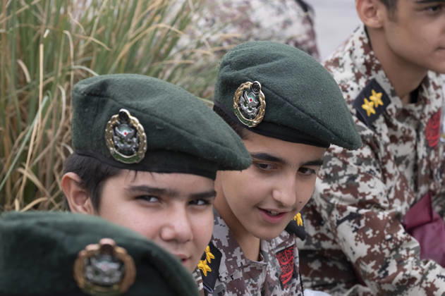 Opening Ceremony Of Second City-Square Military Training Camp Iranian schoolboys wearing military uniforms sit together during the opening ceremony of the second city-square military training camp for self-sacrificing forces in downtown Tehran, Iran, on October 3, 2026. The camp was established by the Basij paramilitary force, with personnel from the Islamic Republic of Iran Army responsible for training the volunteers. Tehran Tehran Iran Copyright: xMortezaxNikoubazlx originalFilename: nikoubazl-openingc261003_npo4f
