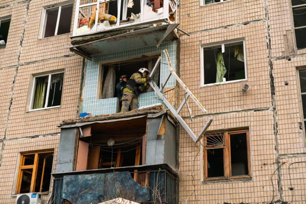 Russian missile attack on Ukraine s Kharkiv KHARKIV, UKRAINE - OCTOBER 5: Firefighters and emergency service workers operate at the site of a residential building struck by a guided bomb in Kharkiv, Ukraine on October 5, 2026. A guided bomb hit a residential building, killing at least two people and injuring over 30 others. The strike destroyed several parked vehicles and damaged more than 40 surrounding houses, with search, rescue, and cleanup operations ongoing by police, firefighters, and volunteers. Carlo Bravo Anadolu Kharkiv Ukraine. Editorial use only. Please get in touch for any other usage.  Copyright: x2026xAnadoluxCarloxBravox