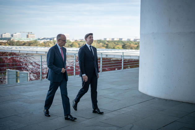 Chancellor Friedrich Merz with his guest Mindaugas Sinkeviciusius, Prime Minister of Lithuania, at the Federal Chancellery; on the terrace of the Federal Chancellery overlooking the Reichstag building, home to the Bundestag; the Federal Chancellor welcomes the Prime Minister of the Republic of Lithuania at the Federal Chancellery, Berlin, Germany; Federal Chancellery