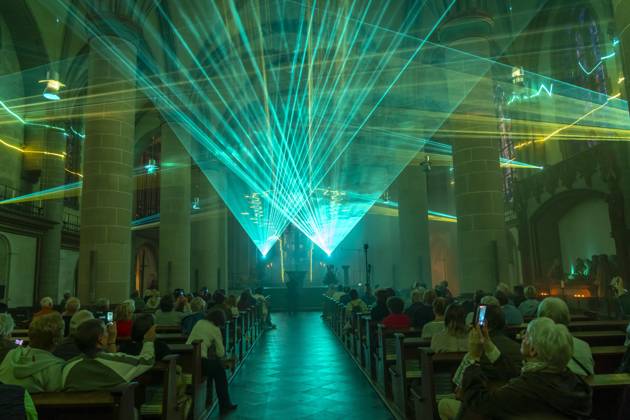 Essen Light Festival, downtown, Licht Segen Lumen Cantus, a laser show synchronized to music at Essen Cathedral, by lighting designer Manfred Olma, accompanied by live organ music, North Rhine-Westphalia, Germany, Essen Light Festival