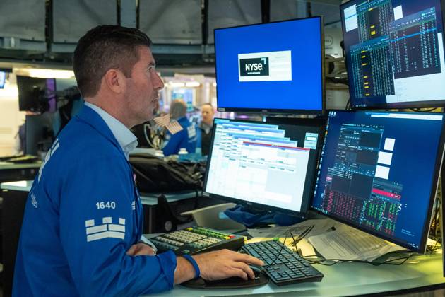 October 5, 2026, New York, New York, USA: A trader works on the trading floor of the New York Stock Exchange (NYSE) in New York, NY on October 5, 2026. New York USA - ZUMAr339 20261005_znp_r339_010 Copyright: xLevxRadinx