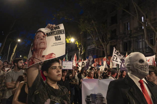 October 5, 2026, Barcelona, Catalonia, Spain: A protester is seen displaying a portrait of Maricarmen, the elderly woman evicted in Madrid. Mobilized by the Barcelona Tenants Union and following the expiration of the Maricarmen decree that regulated the right to housing thousands of people have demonstrated in central Barcelona, ??calling for a general strike. Barcelona Spain  - ZUMAs197 20261005_aaa_s197_111 Copyright: xPacoxFreirex