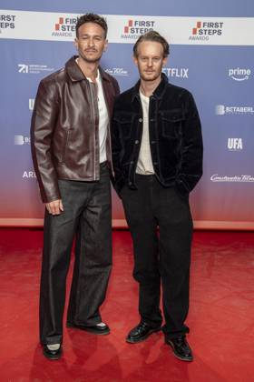 ABB FIRSTSTEPS: Vladimir Burlakov and Patrick Gueldenberg on the red carpet at the 2026 FIRST STEPS Awards ceremony at the Theater des Westens on October 5, 2026, in Berlin, Germany