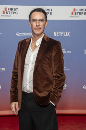 ABB FIRSTSTEPS: Sascha Schwingel walks the red carpet at the 2026 FIRST STEPS Awards ceremony at the Theater des Westens on October 5, 2026, in Berlin, Germany