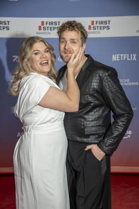 ABB FIRSTSTEPS: Gisa Flake and Knud Riepen walk the red carpet at the 2026 FIRST STEPS Awards ceremony at the Theater des Westens on October 5, 2026, in Berlin, Germany