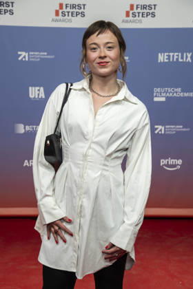 ABB FIRSTSTEPS: Linda Belinda Podszus walks the red carpet at the 2026 FIRST STEPS Awards ceremony at the Theater des Westens on October 5, 2026, in Berlin, Germany