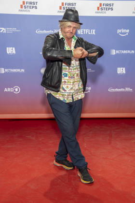 ABB FIRSTSTEPS: Detlev Buck appears on the red carpet at the 2026 FIRST STEPS Awards ceremony at the Theater des Westens on October 5, 2026, in Berlin, Germany