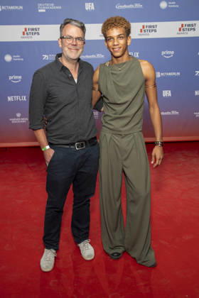 ABB FIRSTSTEPS: Robert Thalheim and Salimou Thiam on the red carpet at the 2026 FIRST STEPS Awards ceremony at the Theater des Westens on October 5, 2026, in Berlin, Germany