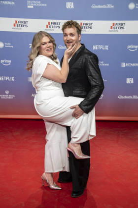 ABB FIRSTSTEPS: Gisa Flake and Knud Riepen walk the red carpet at the 2026 FIRST STEPS Awards ceremony at the Theater des Westens on October 5, 2026, in Berlin, Germany