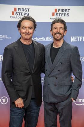 ABB FIRSTSTEPS: Martin Bachmann and Oliver Berben on the red carpet at the 2026 FIRST STEPS Awards ceremony at the Theater des Westens on October 5, 2026, in Berlin, Germany