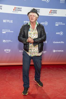 ABB FIRSTSTEPS: Detlev Buck appears on the red carpet at the 2026 FIRST STEPS Awards ceremony at the Theater des Westens on October 5, 2026, in Berlin, Germany