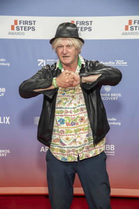 ABB FIRSTSTEPS: Detlev Buck appears on the red carpet at the 2026 FIRST STEPS Awards ceremony at the Theater des Westens on October 5, 2026, in Berlin, Germany