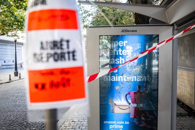 A broken glass panel is seen at a bus stop in the centre of Liege as students gather outside several schools in Liege during a protest against education reforms and budget cuts, on Tuesday 6 October 2026. Yesterday police arrested 16 people after the protests turned violent. The protests in French-speaking Belgium have been ongoing for months, following a series of reforms and budget cuts introduced by the French Community Government.  JONASxROOSENS 188939307