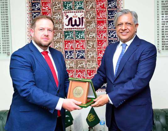 October 6, 2026, Pakistan: Federal Minister for Law and Justice, and Human Rights, Senator Azam Nazeer Tarar Presents Commemorative Shield to British Minister of State Stephen Doughty in Islamabad Pakistan  - ZUMAas3_ 20261006_zaf_as3_061 Copyright: xPPIx