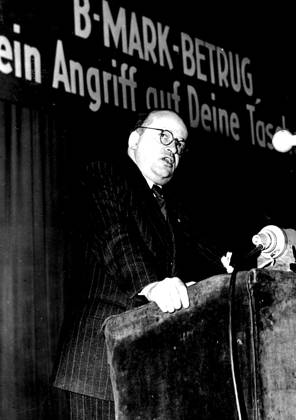 Berlin s Communist Mayor Attacks Britain, Currency Protest Meeting -- Friedrich Ebert, Communist Mayor of Eastern Berlin and son of the first German President, launching his attack against Britain during a meeting objecting to the Continuance of western currency in this city. Ebert, speaking in the Friedrichstadt Place, soviet sector, seized the recent Oliver Twist film demonstrations as a British-inspired move. It was no accident that at the very moment when a currency panic was created, another turmoil was arranged , he asserted. February 26, 1949.  Copyright: xCopyrightxUnknownx 5513-72811877