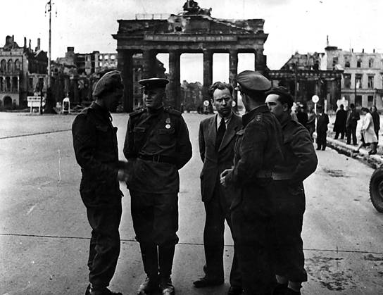 ** Pole acts as an interpreter. In the background is the British