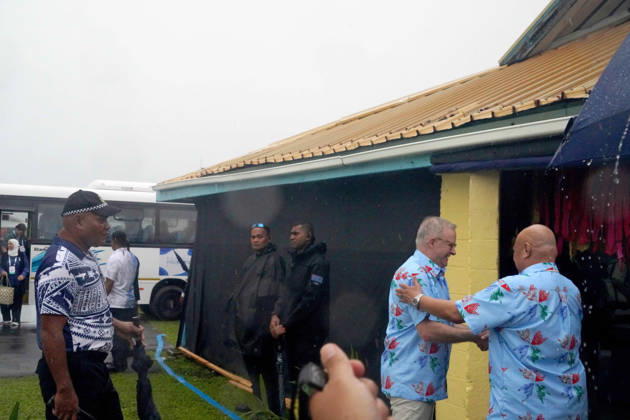 October 6, 2026, Funafuti, Funafuti, Tuvalu: Australian Prime Minister ANTHONY ALBANESE is greeted by Tuvaluan Prime Minister FELETI TEO upon arrival in Funafuti, Tuvalu for the Pre-COP31 Leaders™ event on October 6, 2026. Complementing the ministerial meeting in Fiji, the visit brings global decision-makers to the low-lying Pacific island nation to witness climate impacts and community adaptation efforts firsthand and advance climate action ahead of COP31 in Antalya, Türkiye. Funafuti Tuvalu - ZUMA 20261006_int_h213_010 Copyright: xHuang Mendersx