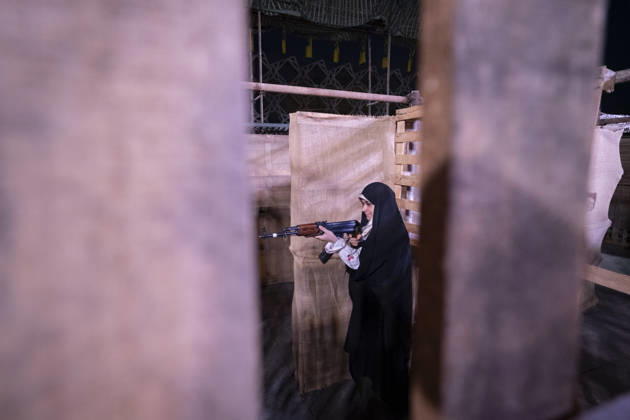 Urban Warfare Training For Iran s Female Self-sacrificing Forces A member of Iran s female self-sacrificing forces carries an AK-47 rifle while taking part in urban warfare training at a city-square military training camp in southern Tehran, Iran, on October 6, 2026, amid rising tensions between Iran and the United States. Tehran Tehran Iran  Copyright: xMortezaxNikoubazlx originalFilename: nikoubazl-urbanwar261006_npy7I.jpg