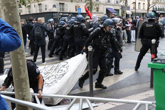 Student blockade near Sciences Po Paris PARIS, FRANCE - OCTOBER 7: A heavy police presence is deployed at the scene as students denounce conditions in the education system and express solidarity with mobilized high school students in Paris, France, on October 7, 2026. Students gather behind makeshift barricades made of trash bins and metal barriers near Sciences Po Paris as part of ongoing mobilization linked to the broader high school and university protest movement. Umit Donmez Anadolu Paris France. Editorial use only. Please get in touch for any other usage. Copyright: x2026xAnadoluxUmitxDonmezx