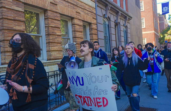 Pro-Palestinian protest at New York University NEW YORK, UNITED STATES - OCTOBER 04: A group of pro-Palestinian New York University (NYU) students walked out of classes to protest NYU and Israel, and marched outside the school buildings in New York, U.S., on October 7, 2026, marking the anniversary of the October 7 attacks on Gaza. Selcuk Acar Anadolu New York United States. Editorial use only. Please get in touch for any other usage.  Copyright: x2026xAnadoluxSelcukxAcarx