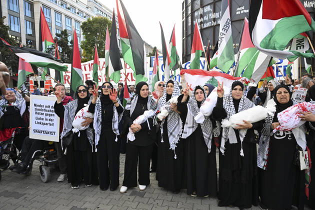 Police in Berlin intervened in demonstrations in support of Palestinians BERLIN, GERMANY - OCTOBER 7: Demonstrators hold toy dolls wrapped in white shrouds to symbolize Palestinian children killed in Israeli attacks, during a pro-Palestine rally organized by Palestinian associations at the intersection of Zimmer and Friedrich streets in Berlin, Germany on October 7, 2026. Halil Sagirkaya Anadolu Berlin Germany. Editorial use only. Please get in touch for any other usage.  Copyright: x2026xAnadoluxHalilxSagirkayax