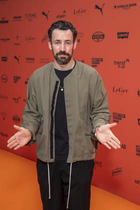 ABB ABOUTYOU host Jan Koeppen as a guest at the ABOUT YOU Opera Fashion Show at the Admiralspalast on October 7, 2026, in Berlin, Germany