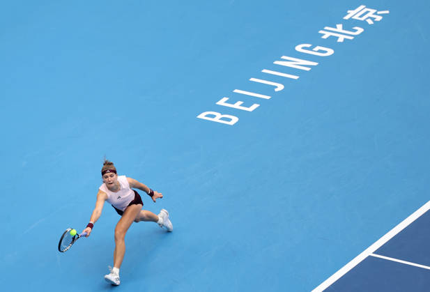 (261008) -- BEIJING, Oct. 8, 2026 -- Karolina Muchova of the Czech Republic hits a return during the women s singles quarterfinal match between Karolina Muchova of the Czech Republic and Nikola Bartunkova of the Czech Republic at 2026 China Open tennis tournament in Beijing, China, Oct. 8, 2026. ) (SP)CHINA-BEIJING-TENNIS-CHINA OPEN-WOMEN S SINGLES (CN) ZhangxChenlin