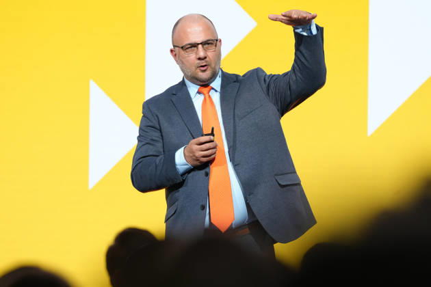 Brand Economy Day 2026: Author and speaker Stefan Kolev on stage during his keynote address at Brand Economy Day 2026, Berlin, October 8, 2026, Berlin, Berlin, Germany