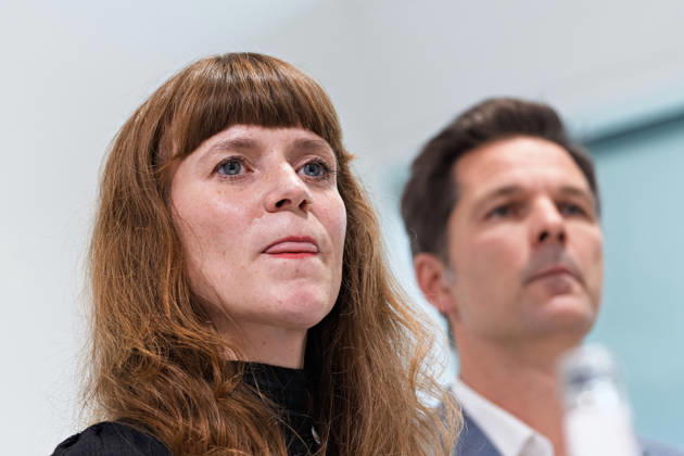Berlin, October 8, 2026: Kerstin Wolter Ehling of Die Linke (front) and Steffen Krach of the SPD listen during a joint press statement following the conclusion of their parties’ preliminary talks in the foyer of the Haus der Statistik. Press statement by Die Linke, the Greens, and the SPD in Berlin