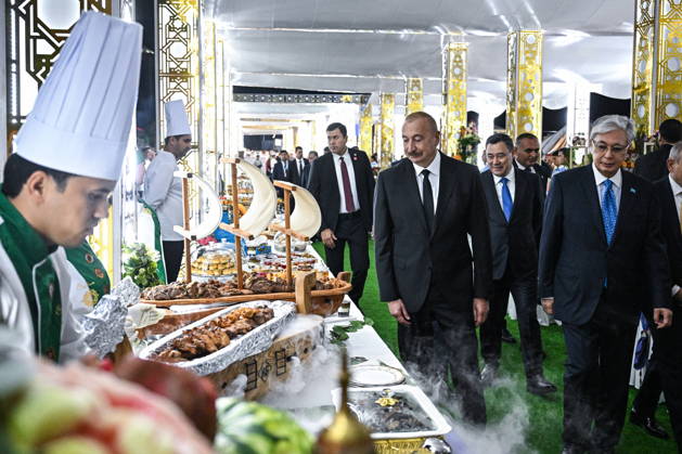 TURKMENISTAN, BALKAN PROVINCE - OCTOBER 8, 2026: Presidents Kassym-Jomart Tokayev of Kazakhstan, Ilham Aliyev (R-L front) of Azerbaijan, and Sadyr Japarov of Kyrgyzstan visit a traditional food festival in the Awaza National Tourist Zone on the sidelines of a meeting of the CIS (Commonwealth of Independent States) Council of Heads of State in Turkmenbasy Turkmenistan - ZUMAt113 20261008_zaa_t113_550 Copyright: xSergeixBobylevx
