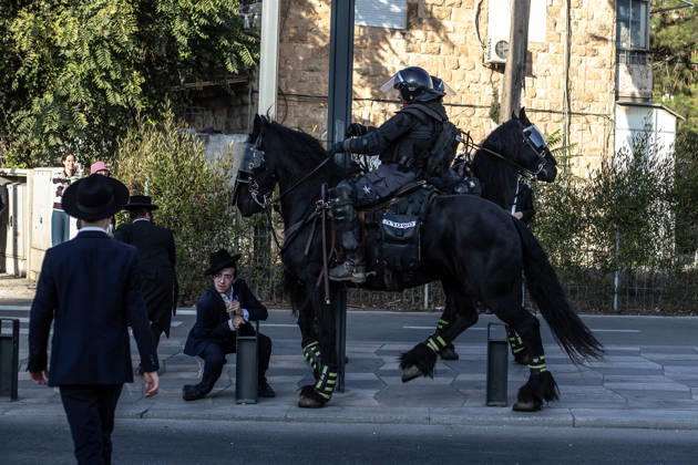 Anti-military service Ultra-Orthodox Jews block road to West Jerusalem JERUSALEM - OCTOBER 8: Mounted Israeli police officers on horseback deployed to the scene intervene against demonstrators as Ultra-Orthodox Jews, known as Haredi, protest the lack of legislation exempting yeshiva students from mandatory military service and the detention of students on grounds of draft evasion in West Jerusalem, Israel, on October 8, 2026. Haredi protesters lie on the road leading to West Jerusalem and block traffic. Mostafa Alkharouf Anadolu Jerusalem Israel. Editorial use only. Please get in touch for any other usage.  Copyright: x2026xAnadoluxMostafaxAlkharoufx